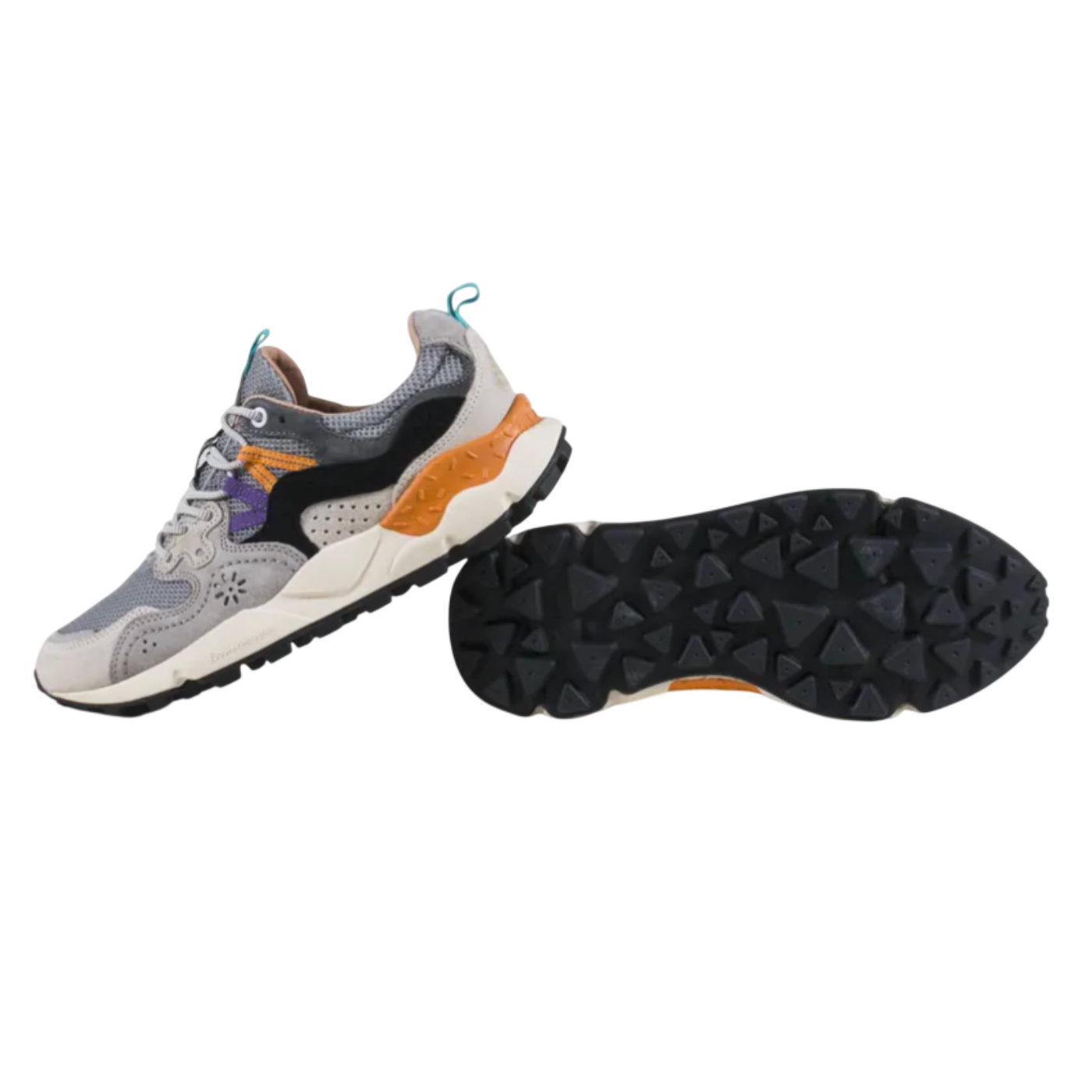 Gray and orange sneaker with black sole on a white background