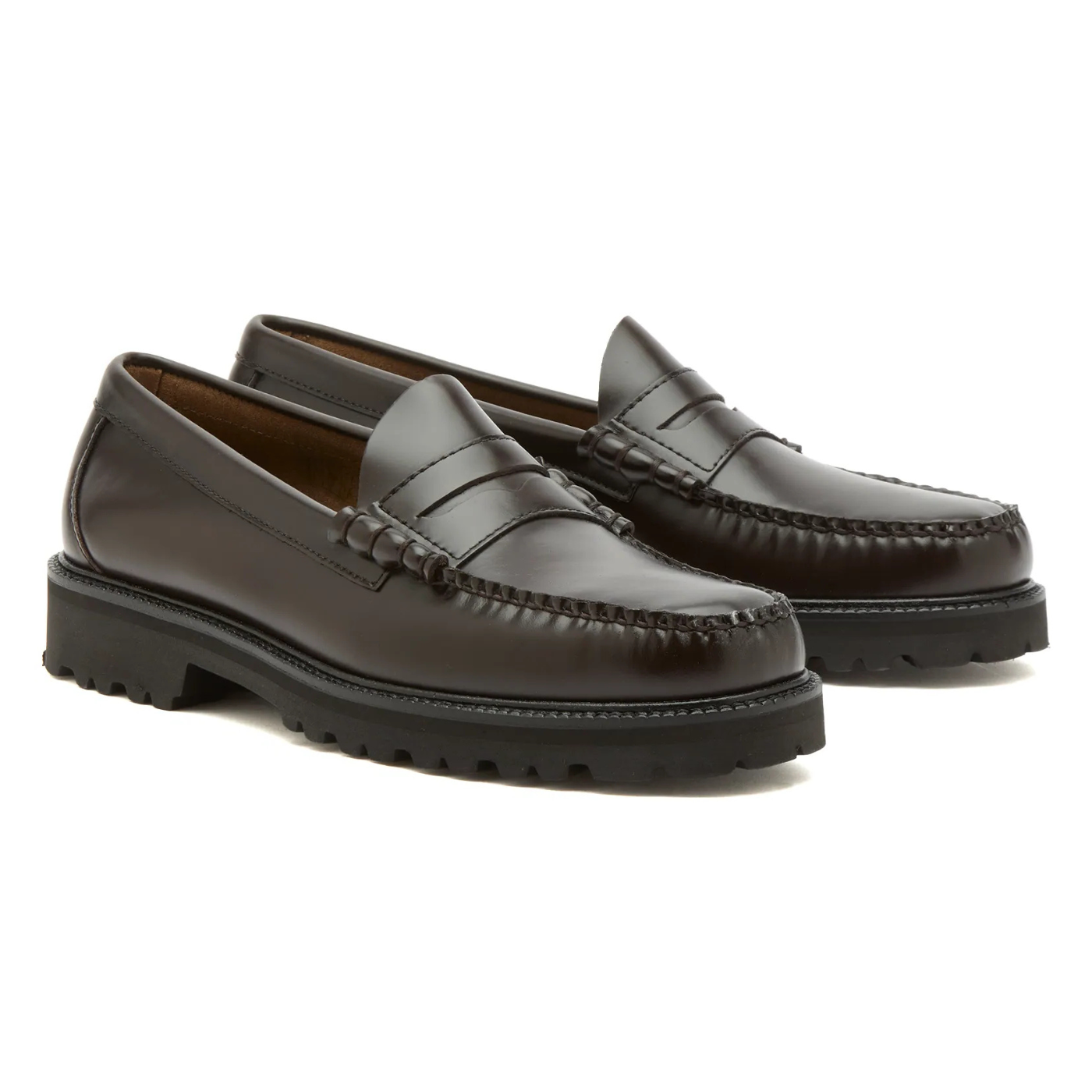 Pair of brown loafers on a white background
