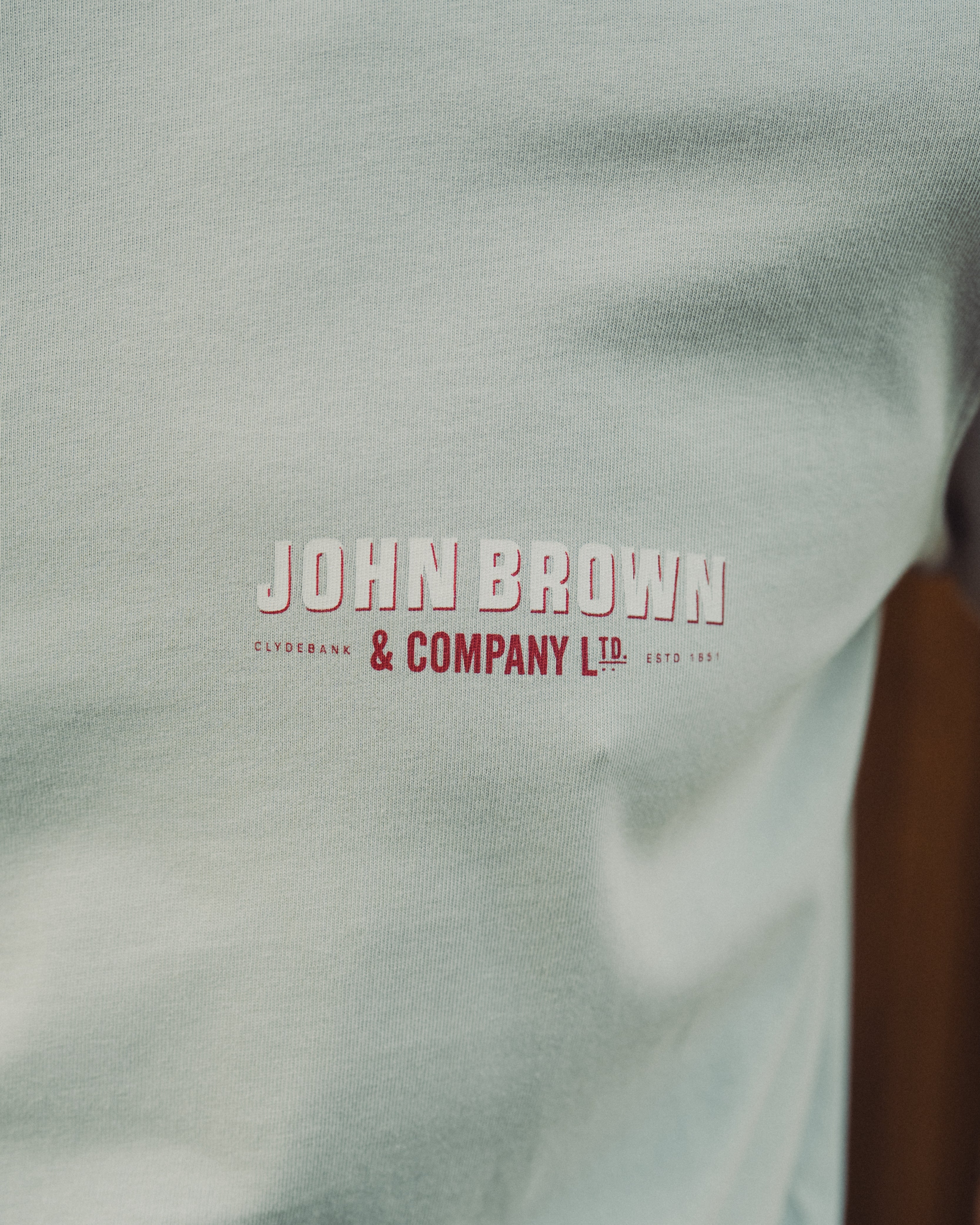 Light gray fabric with 'John Brown & Company Ltd' logo in red and white.