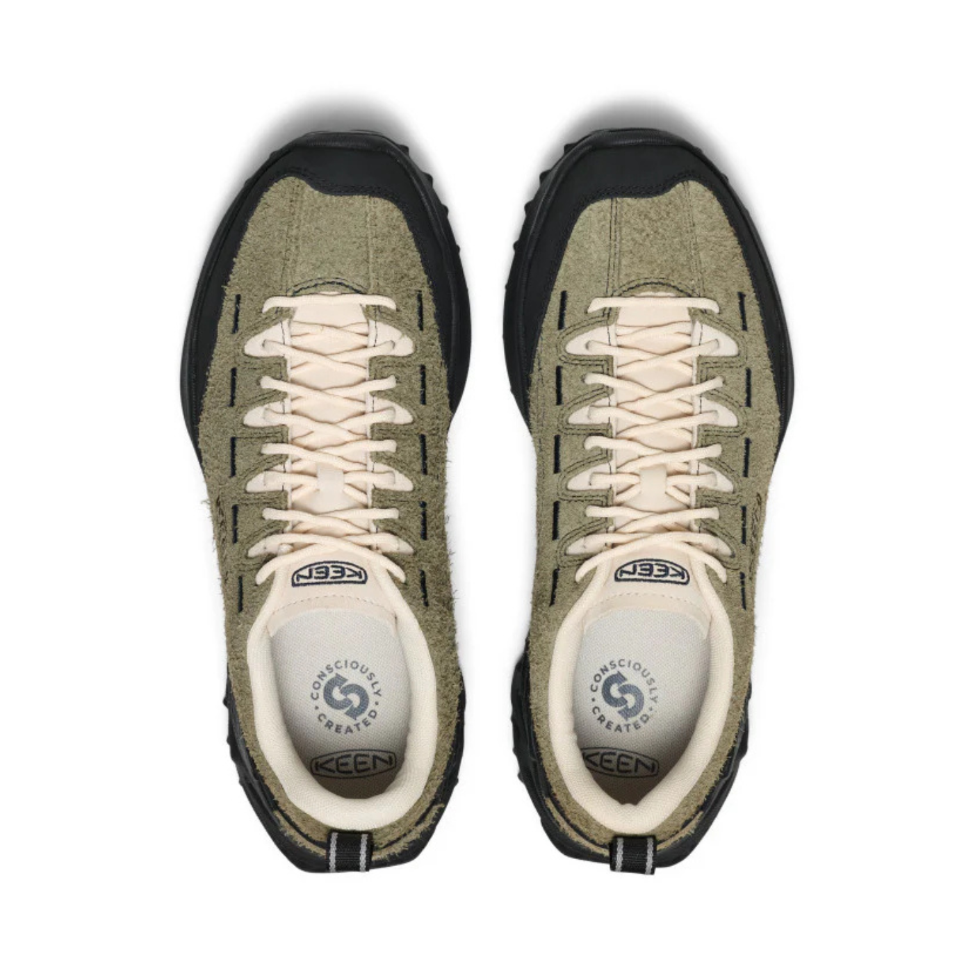 Pair of green sneakers with black soles on a white background