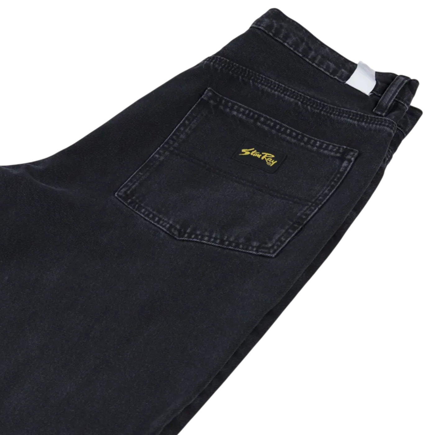 Black jeans with a brand logo on the pocket against a white background