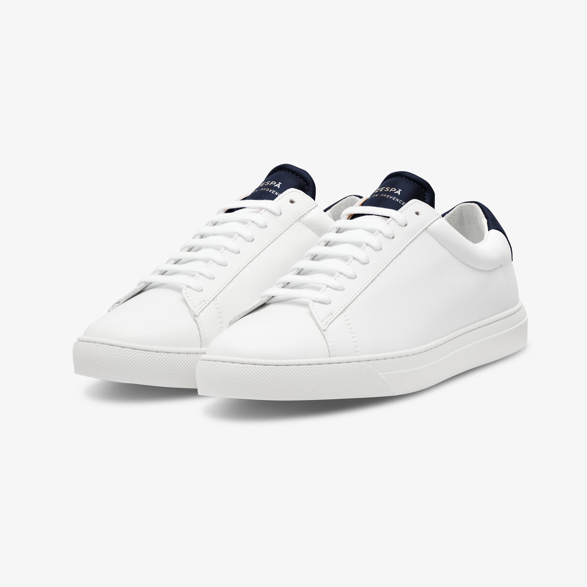 White Zespa sneakers with navy accents on a white background