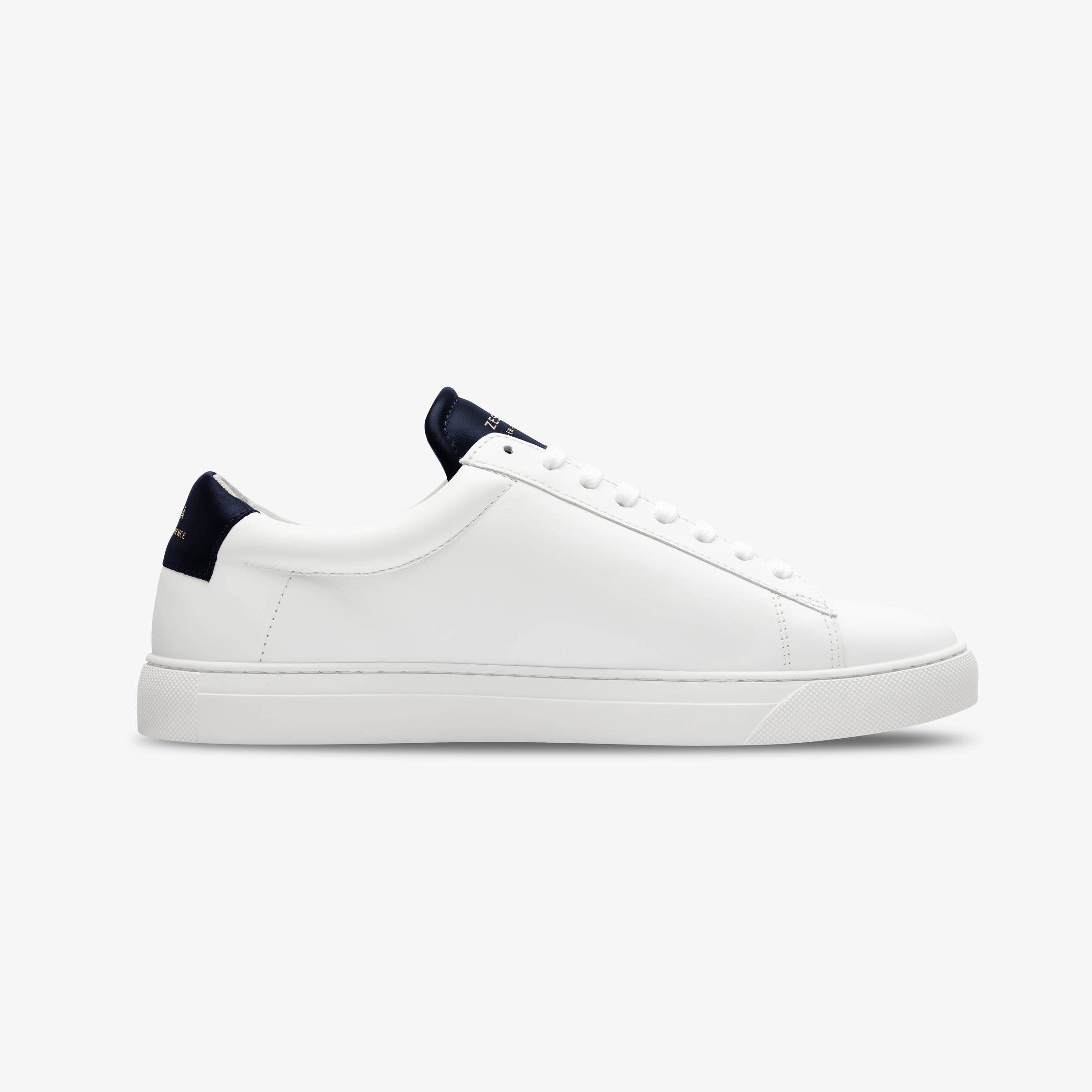White Zespa sneaker with navy accents on a light gray background