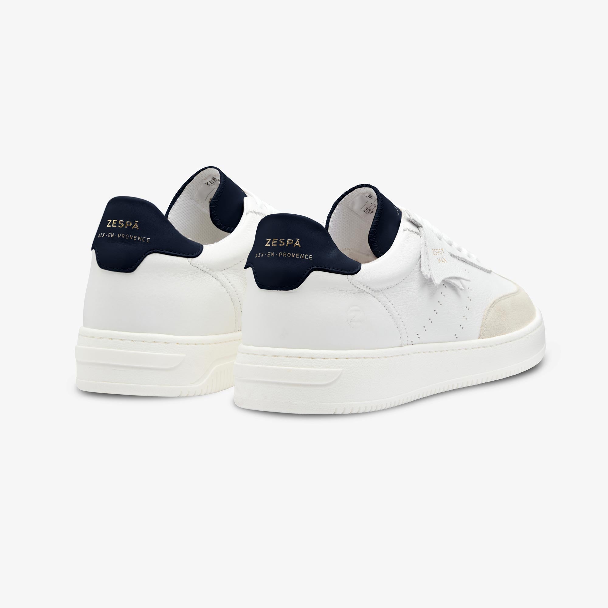 White Zespa sneakers with navy soles on a white background