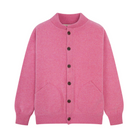 Pink cardigan with brown buttons on a white background