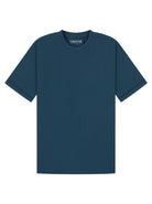 A dark teal short-sleeve crewneck t-shirt with a subtle vertical ribbed texture, shown flat against a solid white background. The brand name 'FURNESTON' is printed in white on the inside of the collar.