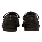 Pair of dark brown leather shoes on a white background