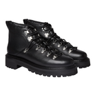 Pair of black leather boots with silver studs on a white background