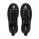 Pair of black leather boots with studded details on a white background