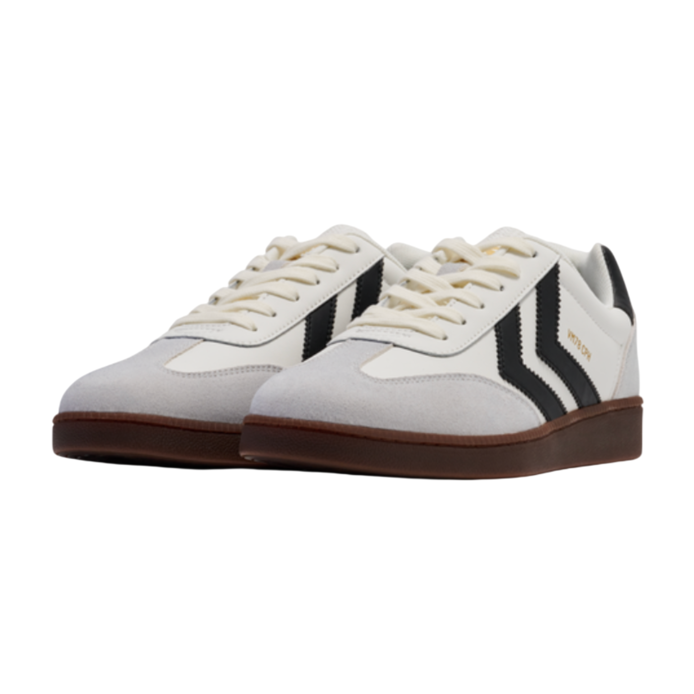 White sneakers with black stripes and brown soles on a white background