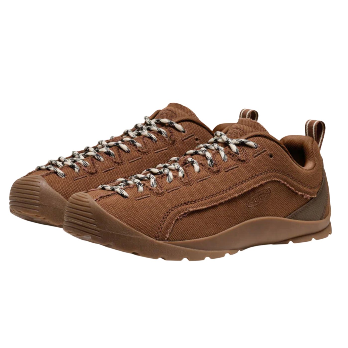 Pair of brown hiking shoes with visible brand logo on a white background