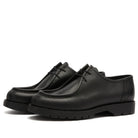 Pair of black leather Kleman Padror shoes on a white background