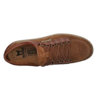 Brown leather shoe with visible branding on a white background