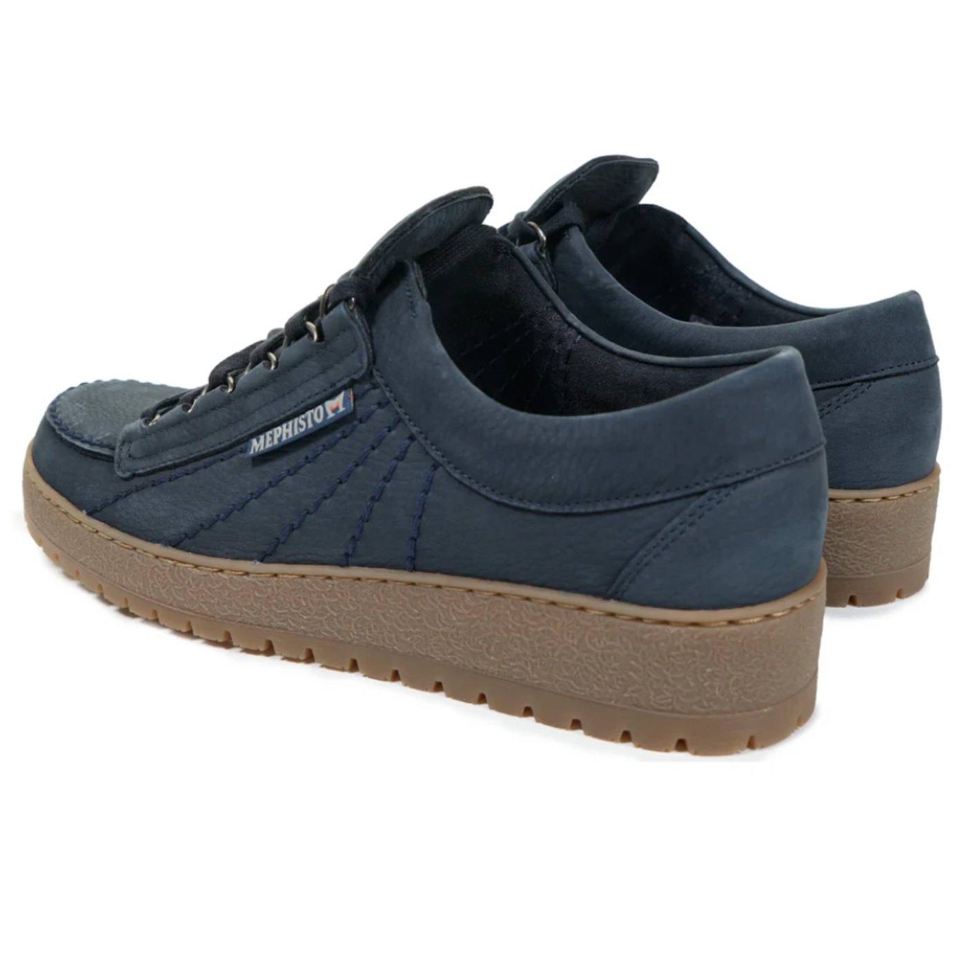 Pair of blue sneakers with brown soles on a white background