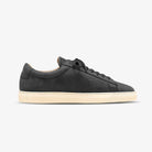 Black Zespa sneaker with a white sole on a light gray background